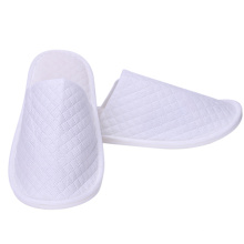 Hotel Guestroom Use Slippers Non-woven Embossed Disposable Slippers Cheap Natural Degradable Hotel Disposable Slippers